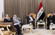 القياديان في حركة المقاومة الإسلامية "حماس" أسامة حمدان، وطاهر النونو خلال زيارة إلى بغداد