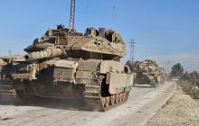 دبابات إسرائيلية في القنيطرة أثناء توغل سابق (رويترز)