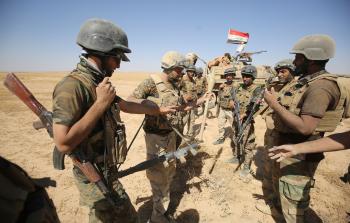 بعض من قوات الحشد الشعبي التي تقاتل في تلعفر (أ ف ب)