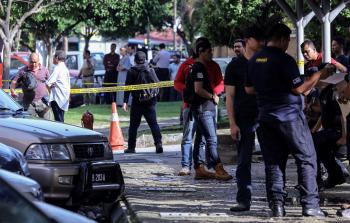 من مكان اغتيال الشهيد البطش (أ ف ب)