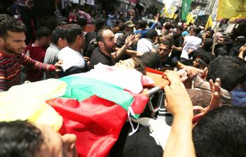 تشييع جثمان الشهيد الطفل عزام عويضة (تصوير / رمضان الأغا)