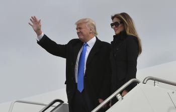 ترامب لحظة وصوله واشنطن (أ ف ب)