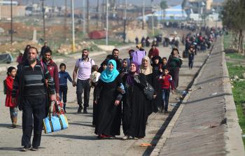 عشرات الآلاف فروا من مدينة الموصل (أ ف ب)