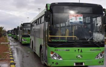 بعض الحافلات المشاركة في إجلاء المحاصرين في شرق حلب (أ ف ب)