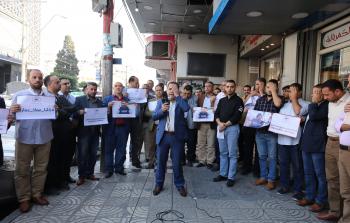 خلال الوقفة التي نظمها منتدى الإعلاميين الفلسطينيين في غزة