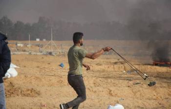 الشهيد محمد حمايدة خلال مشاركته في مسيرات العودة (فلسطين أون لاين)