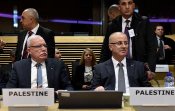 الحمد لله (يميناً)  والمالكي (يساراً) (أ ف ب )