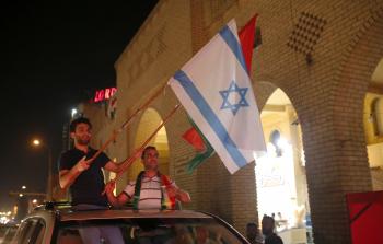 أكراد يحتفلون بنتائج الاستفتاء (الأناضول)