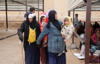 بعض المهجرين من الموصل (أ ف ب)