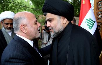 صورة أرشيفية لمقتدى الصدر وحيدر العبادي