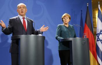 نتنياهو خلال مؤتمر صحفي مع ميركل 