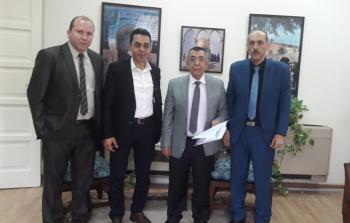 صورة وفد الوطنية العليا خلال تسليمه للدعوة 