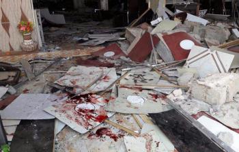 آثار هجوم مسلح في العراق (أ ف ب)