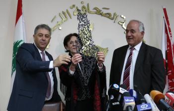 ريما خلف (وسط) (الأناضول)