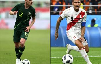 آرون مووي (أستراليا)  ومهاجم بيرو باولو غيريرو - (أ ف ب)