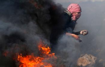 جانب من مواجهات بين الاحتلال والفلسطينيين (أ ف ب) 