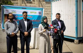 جانب من وقفة للمؤسسات الحقوقية بغزة اليوم (الأناضول)