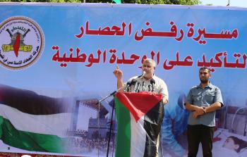 خالد البطش خلال المسيرة الجماهيرية بغزة اليوم  (تصوير/ محمود أبو حصيرة)