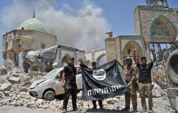 جانب من احتفال القوات العراقية بالتقدم في الموصل (أ ف ب)