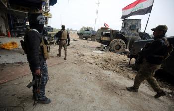 معارك عنيفة تدور بين القوات العراقية وتنظيم الدولة الإسلامية في الجانب الغربي من مدينة الموصل (أ ف ب)
