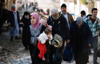 بعض النازحين من الموصل (أ ف ب)