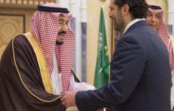 الحريري (يميناً) والعاهل السعودي (يساراً) (أ ف ب)