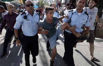 الاحتلال يعتقل أحد الأطفال المقدسيين (أ ف ب) 