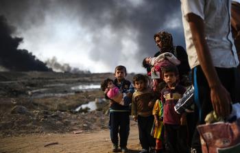 جانب من النازحين من الموصل (أف ب)