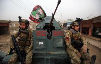 جانب من القوات العراقية المشاركة في الهجوم على شرق الموصل (أ ف ب)