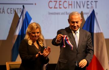 نتنياهو وزوجته (أ ف ب)