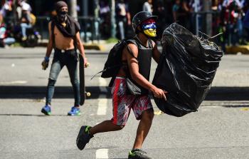 مظاهرات في وقت سابق في فنزويلا (أ ف ب)