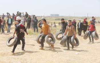 جانب من فعاليات مسيرة العودة أمس (تصوير / رمضان الأغا)