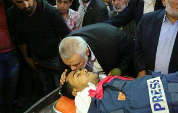 جانب من جنازة الشهيد الصحفي ياسر مرتجى (أرشيف)