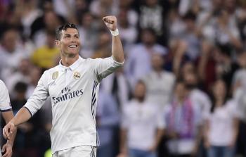 رونالدو يحتفل بفوز فريقه على بايرن ميونخ أمس (أ ف ب)