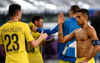 لاعبو باريس سان جيرمان خلال مباراة الأمس (أ ف ب)