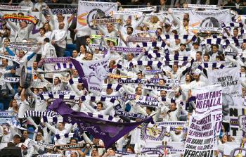 مشجعو ريال مدريد خلال مباراة الأمس (أ ف ب)