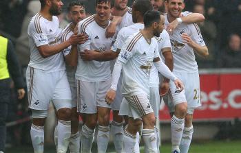 صورة أرشيفية للاعبي فريق ليفربول - (أ ف ب)