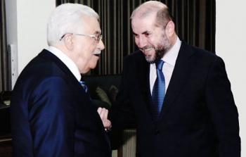 محمود الهباش (يميناً) ومحمود عباس (يساراً) (أرشيف)