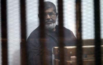 مرسي خلال المحاكمة (الأناضول)