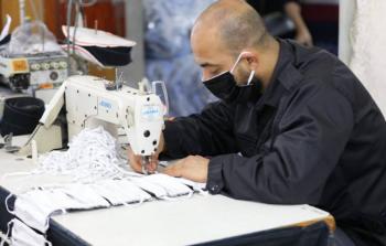 جانب من تصنيع المديرية العامة للمالية والإمداد بوزارة الداخلية للكمامات