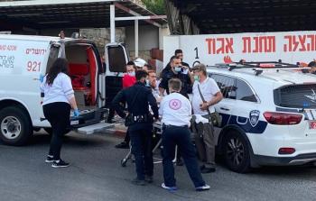 لقطة للمتطرف اغليك وهو ينقل عبر إسعاف بعد إصابته