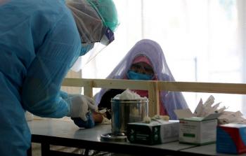 تعامل الطواقم المختصة مع العائدين