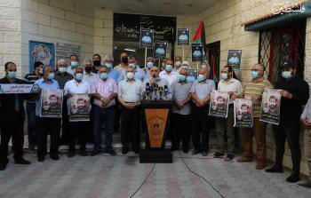 جانب من وقفة تضامنية مع الأسير ماهر الأخرس بغزة - تصوير/ محمود أبو حصيرة