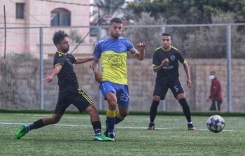 لقطة من مباراة خدمات النصيرات وشباب الزوايدة