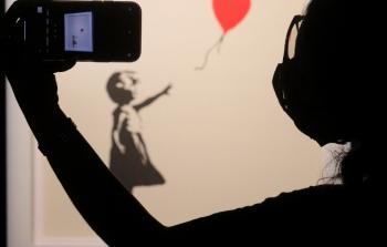 صورة للوحة التي مزقت نفسها - رويترز