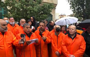 وقفة احتجاجية للنشطاء على محاكمتهم ( صورة أرشيفية)