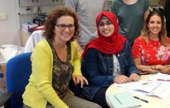 الباحثة براءة عبدالله أبو عساكر  بين زميلاتها