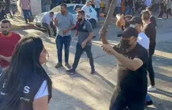 رجل أمن بلباس مدني يعتدي على صحفية بالضفة (أرشفية)