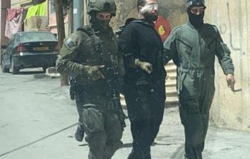 الشاب حاتم زمرد لحظة اعتقاله