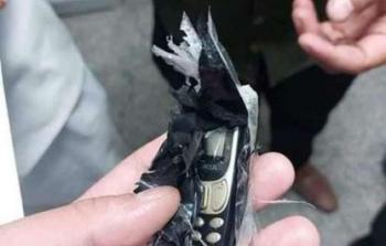 الهاتف المستخرج من بطن الشاب المصري